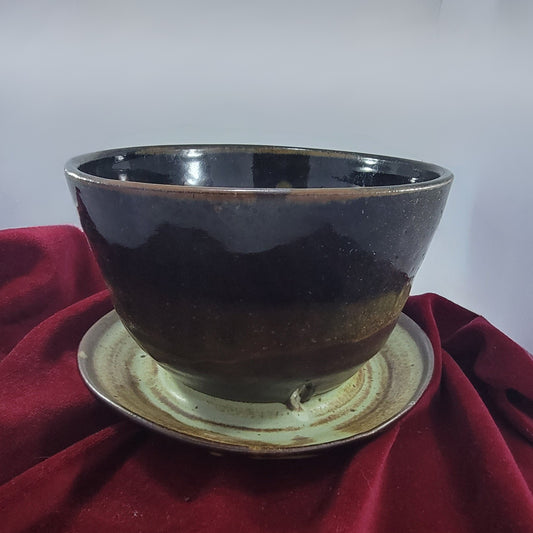 Planter with built in saucer